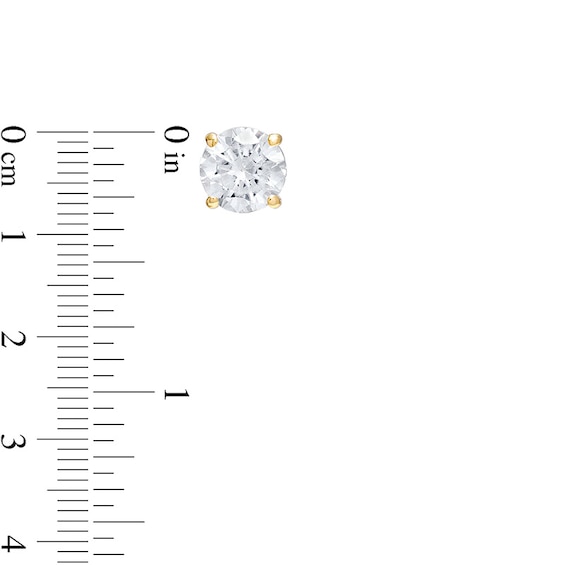 Previously Owned - 1/2 CT. T.w. Diamond Stud Earrings in 14K Gold