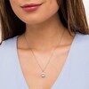 Thumbnail Image 2 of Previously Owned - Oval White Lab-Created Sapphire and 1/10 CT. T.W. Diamond Ornate Frame Pendant in 10K White Gold
