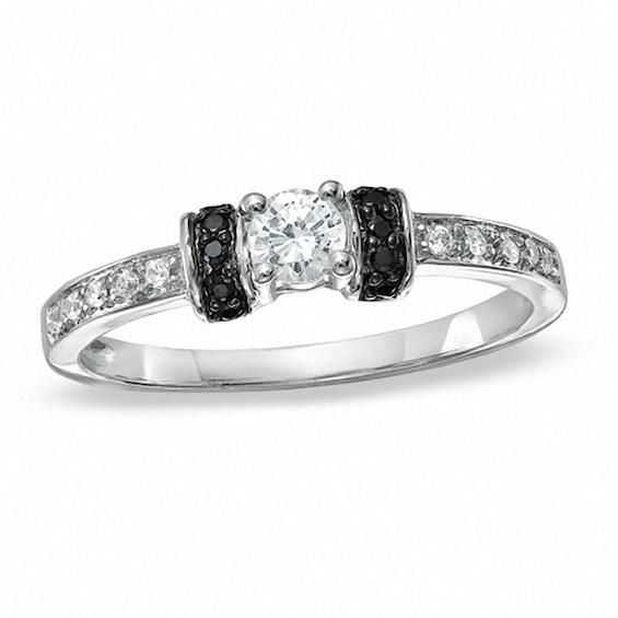 Previously Owned - 1/4 CT. T.w. Black and White Diamond Station Engagement Ring in 10K White Gold