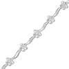 Thumbnail Image 1 of Previously Owned - 1/10 CT. T.W. Diamond Wave Flower Bracelet in 10K White Gold