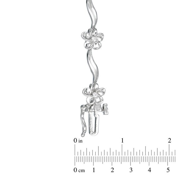 Previously Owned - 1/10 CT. T.w. Diamond Wave Flower Bracelet in 10K White Gold