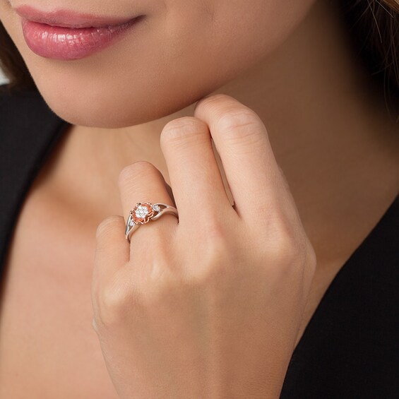 Previously Owned - 1/8 CT. T.w. Composite Diamond Flower Promise Ring in Sterling Silver with 10K Rose Gold Plate