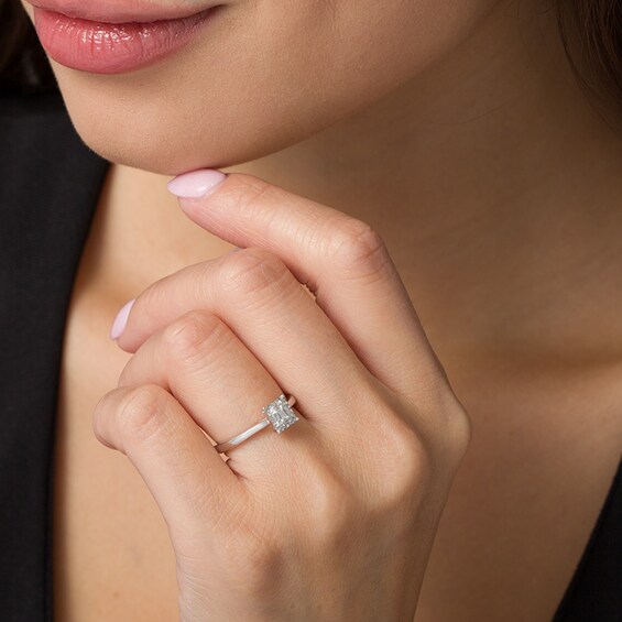 Previously Owned - 1/10 CT. T.w. Baguette and Round Composite Diamond Promise Ring in Sterling Silver