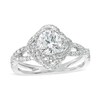 Previously Owned - 1-1/4 CT. T.w. Diamond Swirl Frame Split Shank Engagement Ring In 14K White Gold