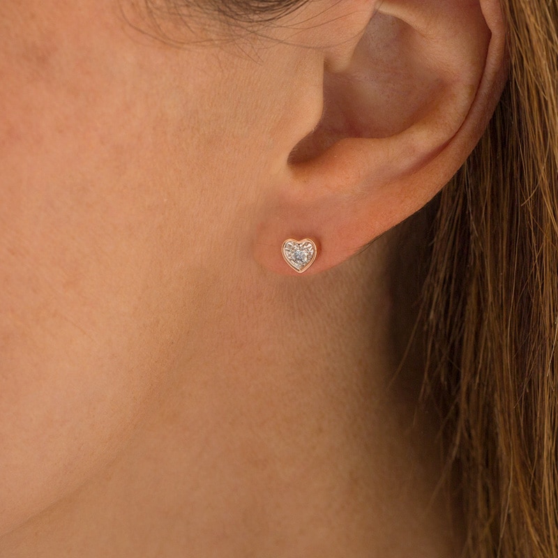 Main Image 2 of Previously Owned - 1/8 CT. T.W. Diamond Solitaire Heart-Shaped Stud Earrings in 10K Rose Gold