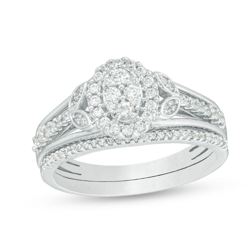 Main Image 1 of Previously Owned - 1/2 CT. T.W. Oval Composite Diamond Leaf-Sides Bridal Set in Sterling Silver