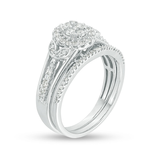 Previously Owned - 1/2 CT. T.w. Oval Composite Diamond Leaf-Sides Bridal Set in Sterling Silver