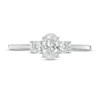 Thumbnail Image 4 of Previously Owned - 5/8 CT. T.W. Oval and Round Diamond Three Stone Engagement Ring in 14K White Gold