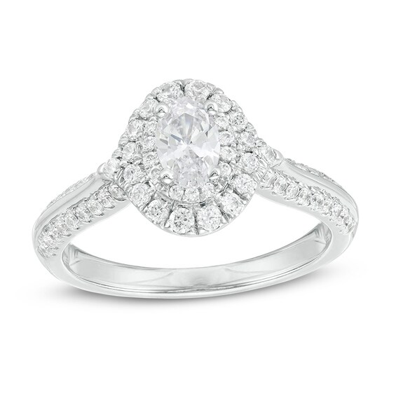 Previously Owned - 1 CT. T.w. Oval Diamond Double Frame Engagement Ring in 14K White Gold