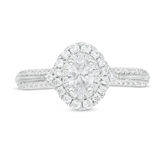 Previously Owned - 1 CT. T.w. Oval Diamond Double Frame Engagement Ring in 14K White Gold