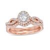 Thumbnail Image 1 of Previously Owned - 1 CT. T.W. Oval Diamond Frame Split Shank Bridal Set in 14K Rose Gold