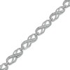 Thumbnail Image 1 of Previously Owned - 1/4 CT. T.W. Diamond Double Infinity Loop Bracelet in Sterling Silver – 7.25"