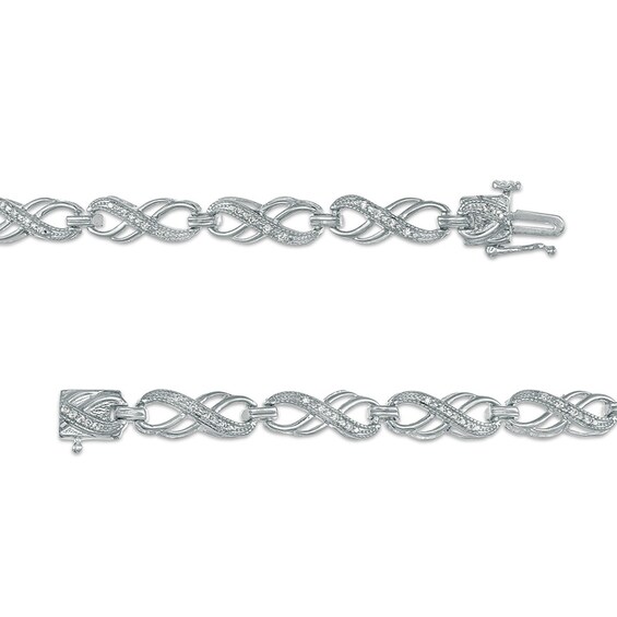 Previously Owned - 1/4 CT. T.w. Diamond Double Infinity Loop Bracelet in Sterling Silver â 7.25"
