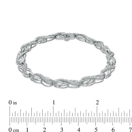 Previously Owned - 1/4 CT. T.w. Diamond Double Infinity Loop Bracelet in Sterling Silver â 7.25"