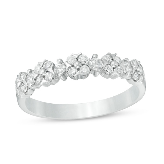 Previously Owned - 1/2 CT. T.w. Diamond Flower Anniversary Band in 14K White Gold