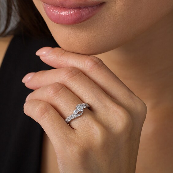 Previously Owned - 3/4 CT. T.w. Diamond Three Stone Double Row Bypass Engagement Ring in 14K White Gold