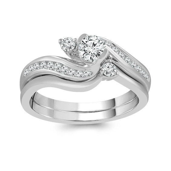 Previously Owned - 5/8 CT. T.w. Diamond Bypass Bridal Set in 14K White Gold