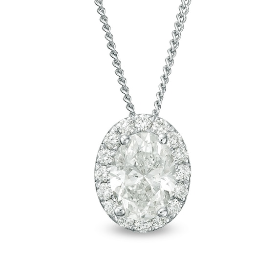 Previously Owned - 1/2 CT. T.w. Oval Diamond Frame Pendant in 14K White Gold (I/Si2)