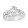 Thumbnail Image 1 of Previously Owned - 1 CT. T.W. Oval Diamond Frame Collar Bridal Set in 14K White Gold (I/I2)