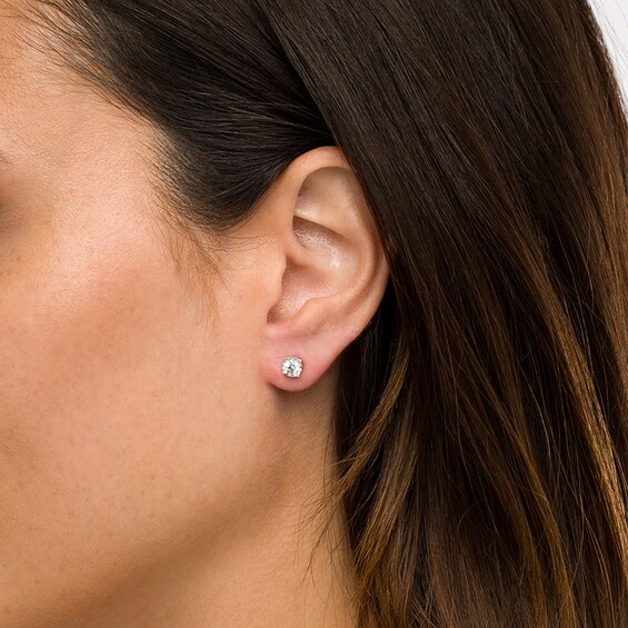 Previously Owned - 1/2 CT. T.w. Diamond Hidden Accent Solitaire Stud Earrings in 10K White Gold