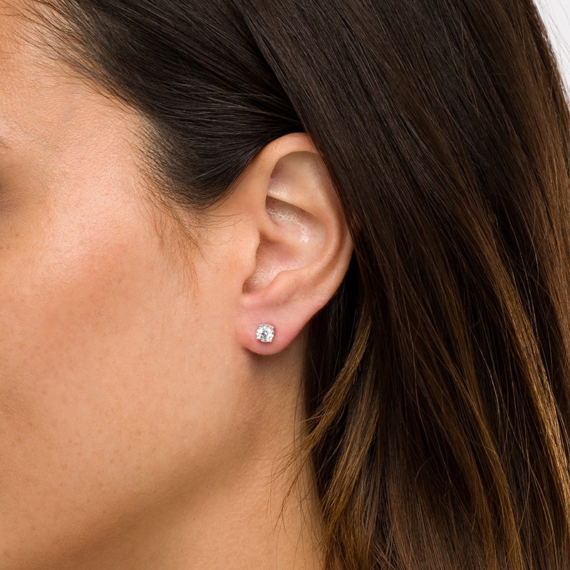 Main Image 2 of Previously Owned - 1/2 CT. T.W. Diamond Hidden Accent Solitaire Stud Earrings in 10K White Gold