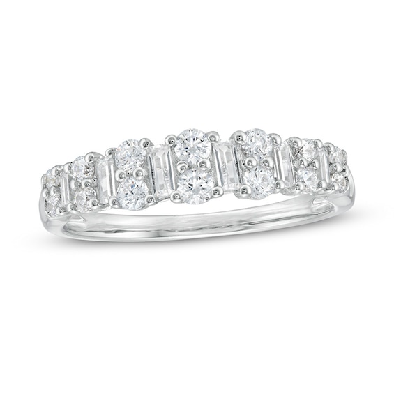 Previously Owned 5/8 CT. T.w. Baguette and Round Diamond Band in 14K White Gold