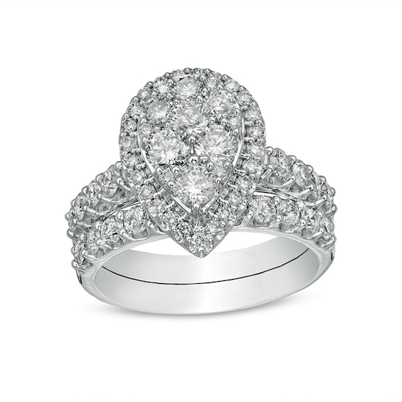 Previously Owned - 2 CT. T.w. Composite Pear Diamond Frame Bridal Set in 14K White Gold