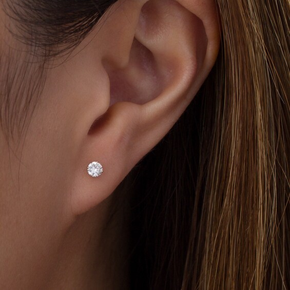 Previously Owned - 1/4 CT. T.w. Diamond Solitaire Stud Earrings in 10K White Gold
