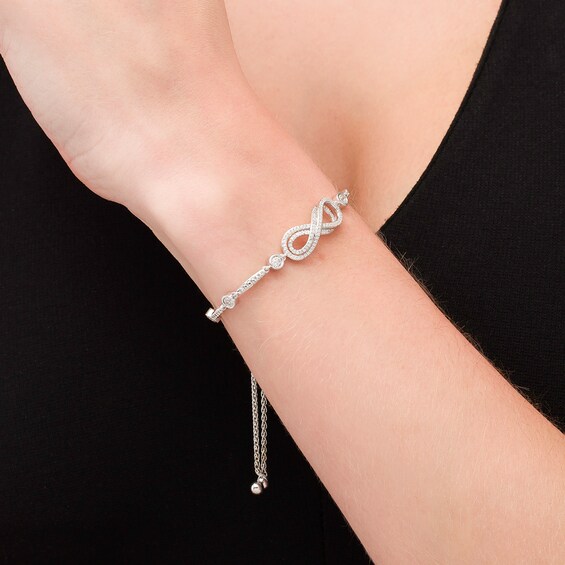 Previously Owned - 3/8 CT. T.w. Diamond Layered Infinity Sideways Bolo Bracelet in Sterling Silver - 9.0"