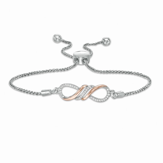 Previously Owned - 1/15 CT. T.w. Diamond Sideways Infinity Bolo Bracelet in Sterling Silver and 10K Rose Gold - 9.5"