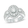Thumbnail Image 1 of Previously Owned - Celebration Ideal 2 CT. T.W. Diamond Layered Oval Frame Three Stone Ring in 14K White Gold (I/I1)