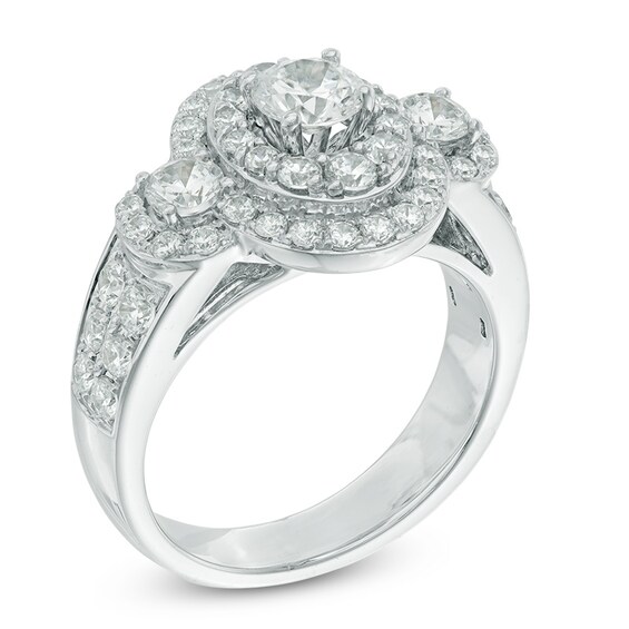 Previously Owned - Celebration Ideal 2 CT. T.w. Diamond Layered Oval Frame Three Stone Ring in 14K White Gold (I/I1)