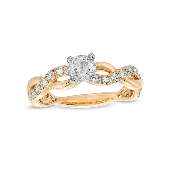 Previously Owned - 1 CT. T.w. Diamond Twist Shank Engagement Ring in 14K Gold