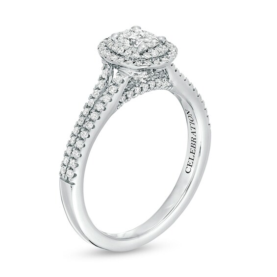 Previously Owned - Celebration Infiniteâ¢ 3/4 CT. T.w. Oval Diamond Frame Split Shank Engagement Ring in 14K White Gold