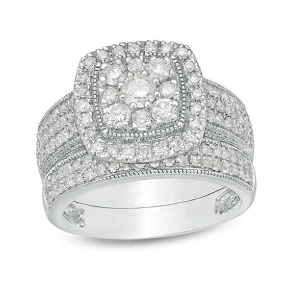 Previously Owned - 1-1/3 CT. T.w. Cushion Multi-Diamond Frame Multi-Row Vintage-Style Bridal Set in 10K White Gold