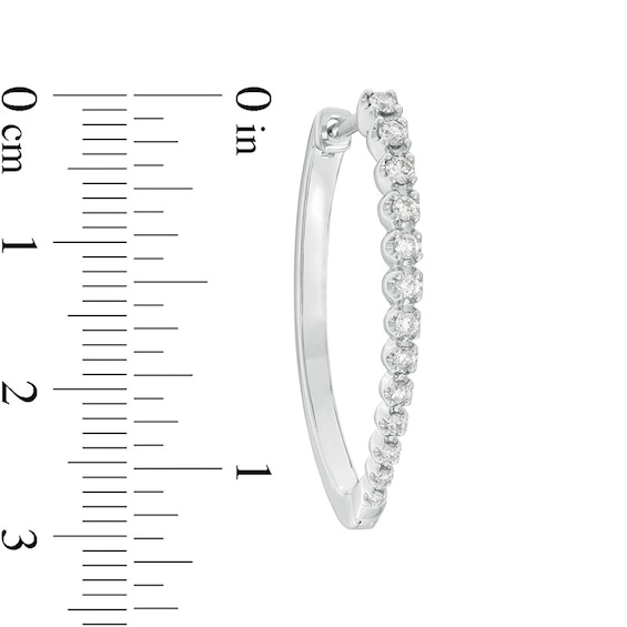 Previously Owned - 1/2 CT. T.w. Diamond Oval Hoop Earrings in 10K White Gold