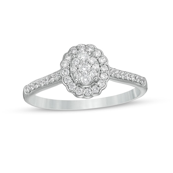 Previously Owned - 1/3 CT. T.w. Composite Oval Diamond Scallop Frame Engagement Ring in 10K White Gold