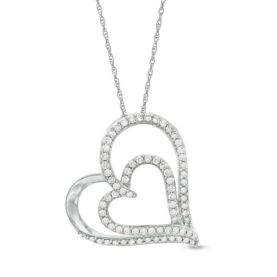 Previously Owned - 1/2 CT. T.w. Diamond Double Tilted Heart Pendant in 10K White Gold