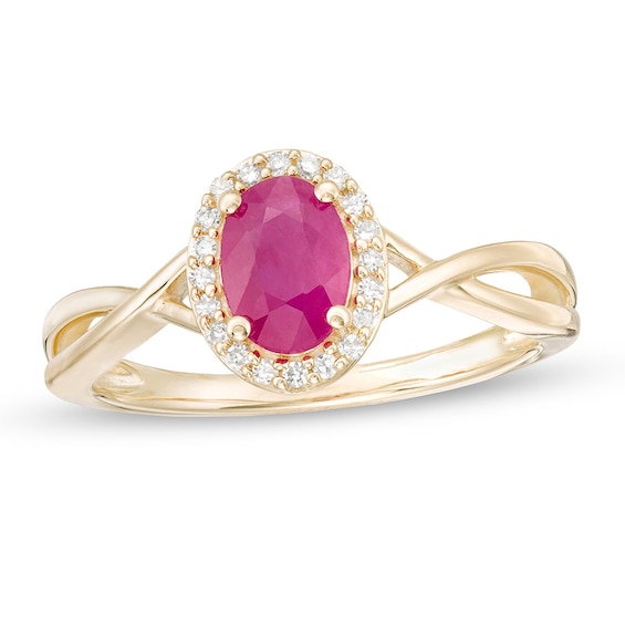 Previously Owned - Oval Ruby and 1/15 CT. T.w. Diamond Frame Twist Shank Ring in 10K Gold