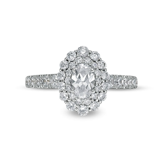 Previously Owned - 1-1/2 CT. T.w. Oval Diamond Double Scallop Frame Engagement Ring in 14K White Gold (I/Si2)