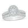 Thumbnail Image 1 of Previously Owned - 1 CT. T.W. Composite Oval Diamond Frame Bridal Set in 14K White Gold