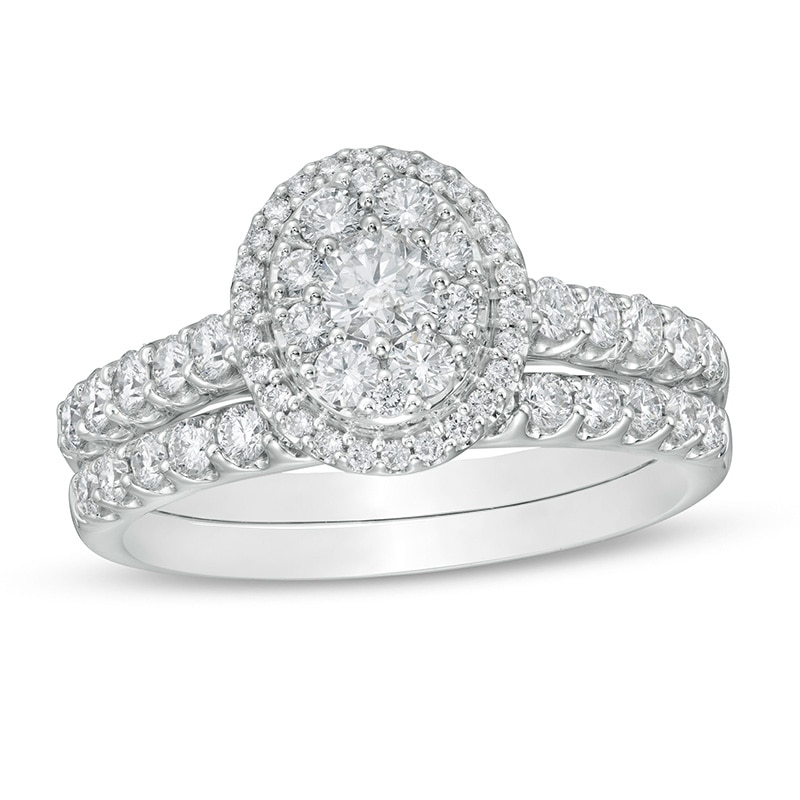 Main Image 1 of Previously Owned - 1 CT. T.W. Composite Oval Diamond Frame Bridal Set in 14K White Gold