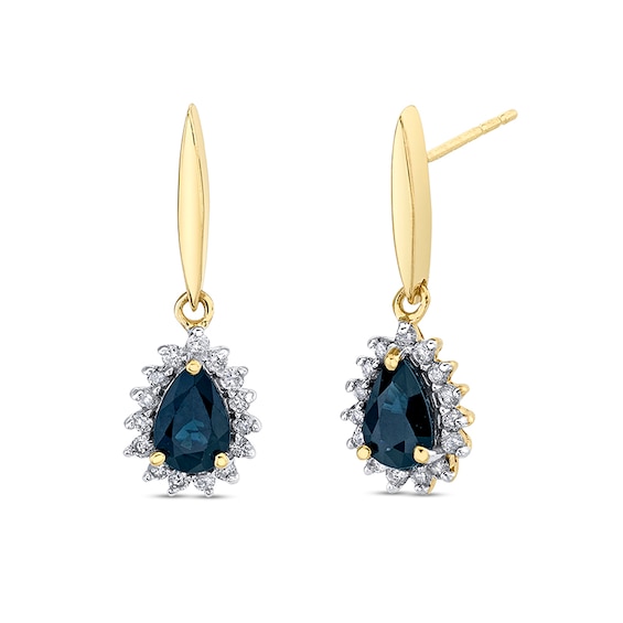 Previously Owned - Pear-Shaped Blue Sapphire and 1/5 CT. T.w. Diamond Sunburst Frame Teardrop Earrings in 14K Gold