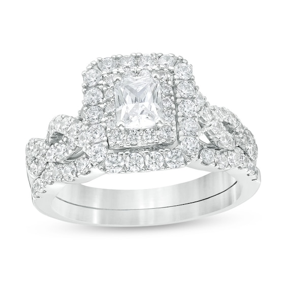 Previously Owned - 1-1/2 CT. T.w. Radiant-Cut Diamond Frame Twist Shank Bridal Set in 14K White Gold (I/I1)
