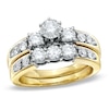 Thumbnail Image 1 of Previously Owned - 1-1/2 CT. T.W. Diamond Three Stone Bridal Set in 14K Gold
