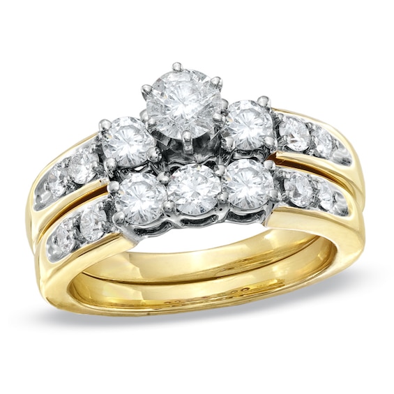 Previously Owned - 1-1/2 CT. T.w. Diamond Three Stone Bridal Set in 14K Gold