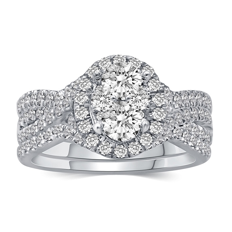 Main Image 1 of Previously Owned - 1-1/5 CT. T.W. Composite Oval Diamond Frame Three Piece Bridal Set in 14K White Gold