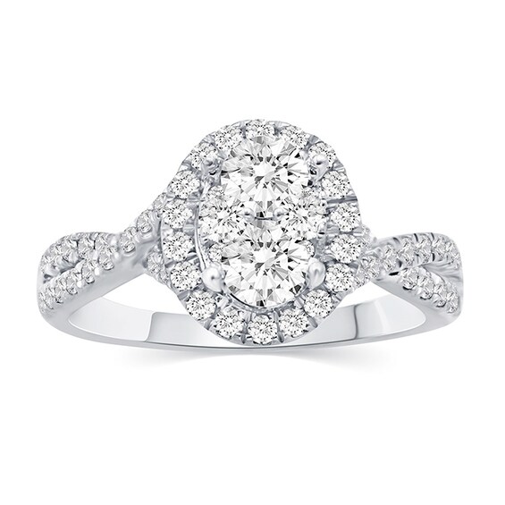 Previously Owned - 1-1/5 CT. T.w. Composite Oval Diamond Frame Three Piece Bridal Set in 14K White Gold