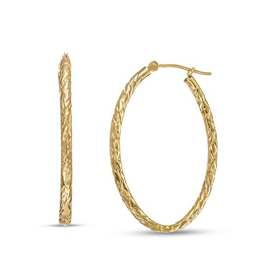 Previously Owned - 30.0mm Diamond-Cut Inside-Out Tube Oval Hoop Earrings in Hollow 10K Gold