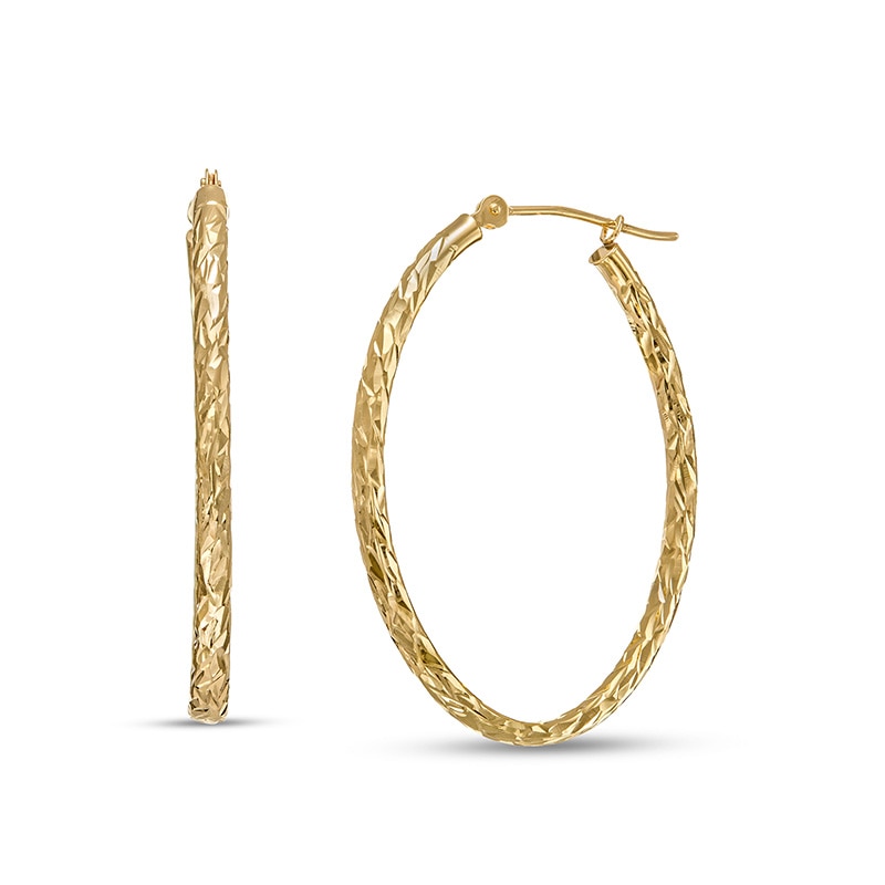 Main Image 1 of Previously Owned - 30.0mm Diamond-Cut Inside-Out Tube Oval Hoop Earrings in Hollow 10K Gold